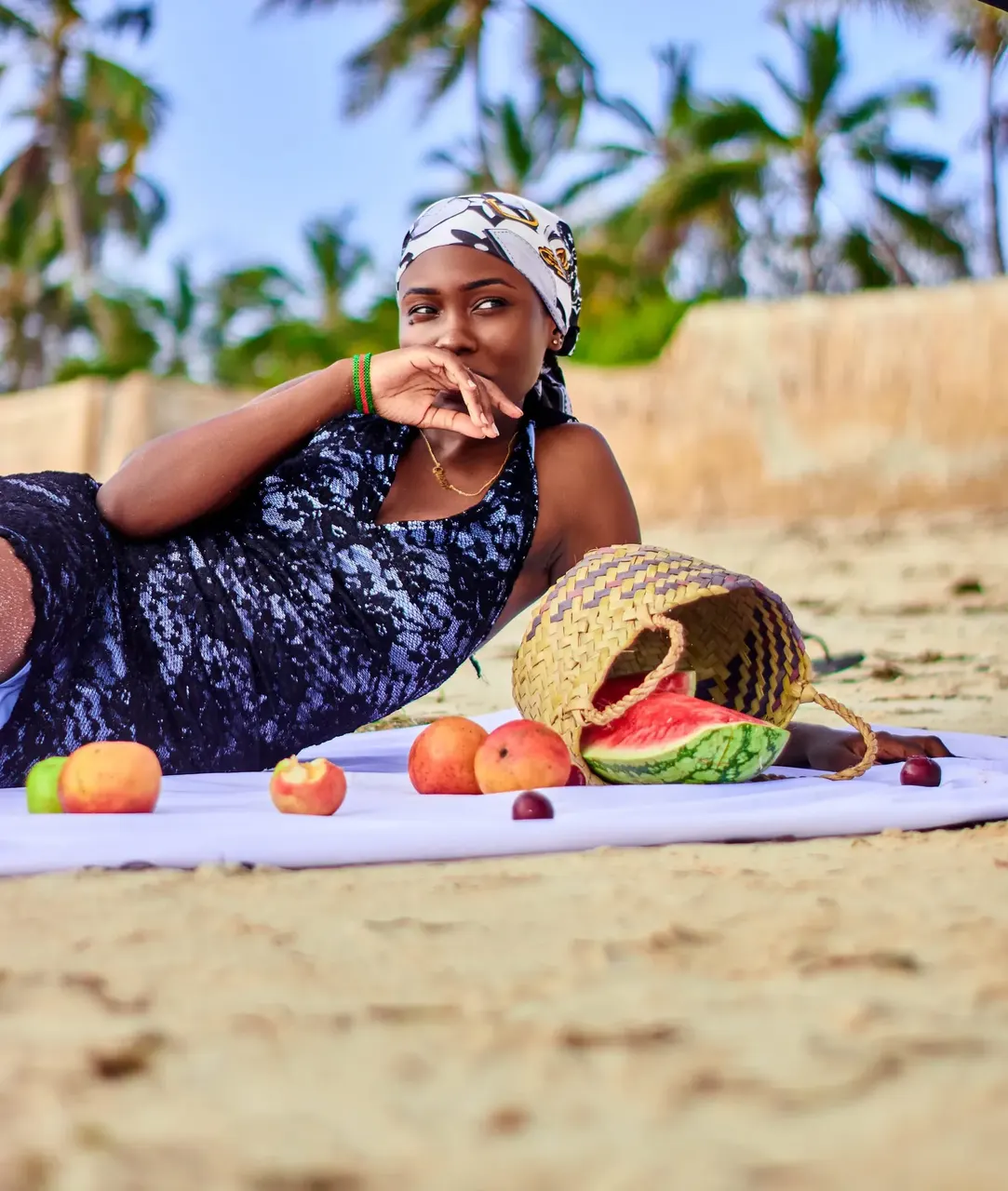 Outdoor beach picnic photoshoot under palm trees on the Kenyan coast