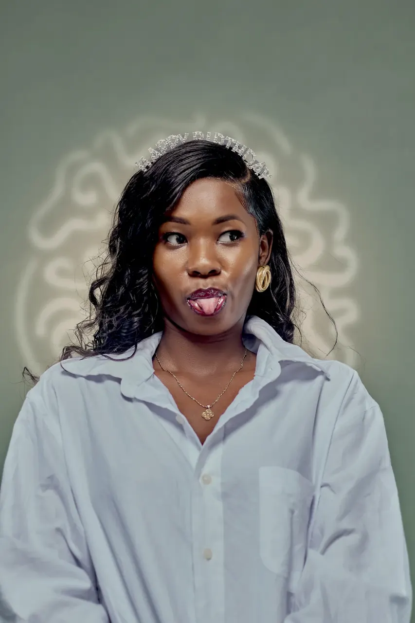 Close-up studio portrait of a woman in a white shirt, Mombasa photo studio